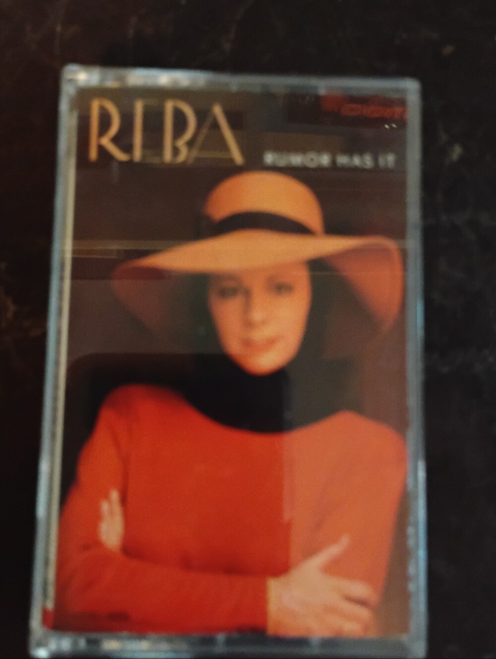 REBA 'Rumor Has It' Cassette Tape - Red & Beige Artwork